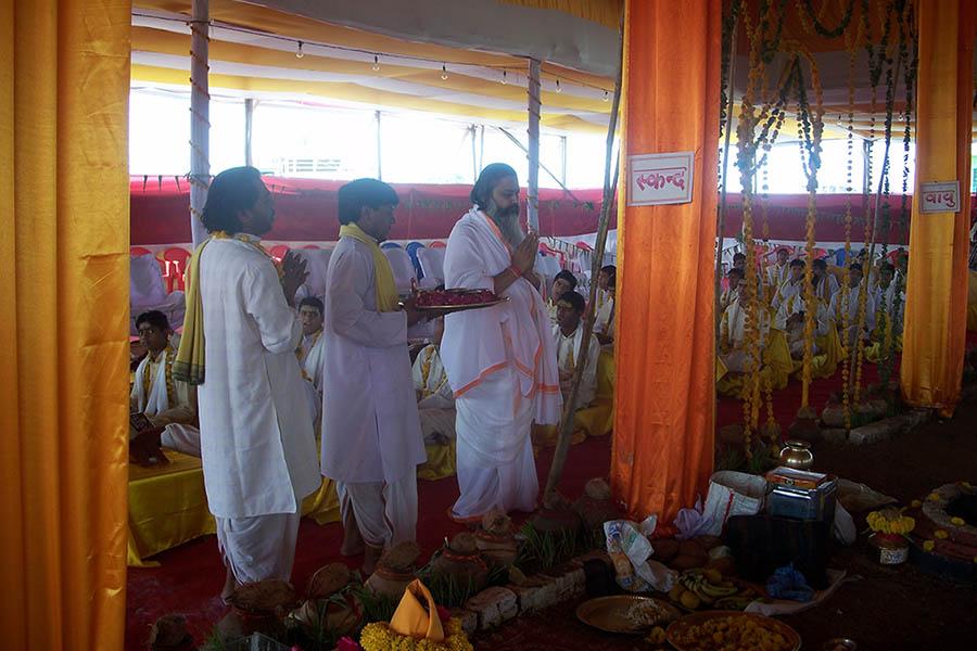 On first day of Chaitra Navararti 2009 Shri Lakshchandi Mahayagya sankalpa was taken by Brahmachari Girish Ji at Gurudev Brahmanand Saraswati Ashram, Chhan, Bhopal. Since then 4 Shri Lakshchandi Mahayagyas have completed and 5th one is continuing. In Lakshchandi Yagya 1,00,000 paath (chanting) of Shri Durga Saptshati is done with 70,000 ahuties (offerings) in 9 Dhawan kunds (fire pits).